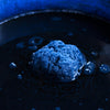 Fructose indigo vat set up in a bucket for home dyeing